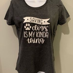 Woman’s Saving dogs in kinda my thing short sleeve shirt.